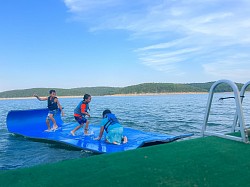 Kids playing on the lilly pad having a good time! Dont forget to bring you lake necessities😉